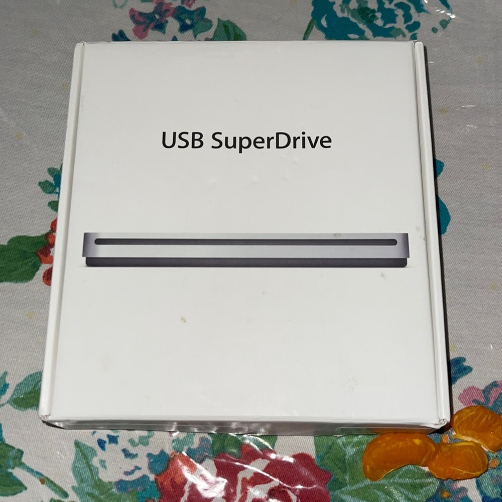 USB SuperDrive. External disc system. Allows Macbook users to use discs.